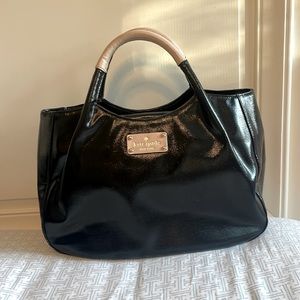 Black, Kate Spade, New York bag with tan handles